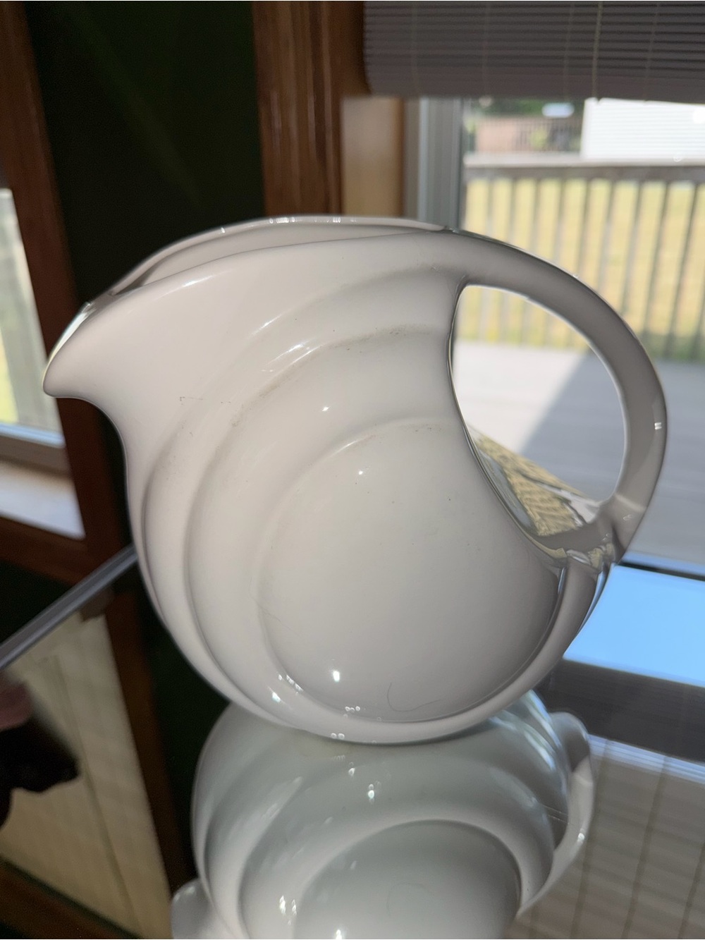 Hall White Ceramic Water Pitcher with Sculpted Wave Design